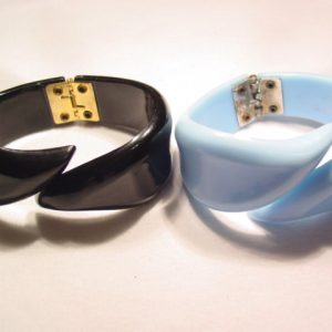 Black and Blue Plastic Clamper Bracelets Set