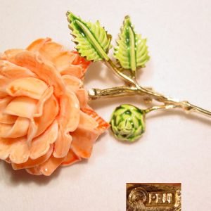 Pell Plastic Rose Pin