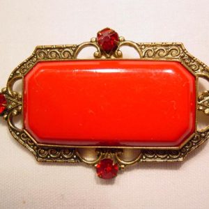 Old Red Plastic and Red Rhinestone Pin