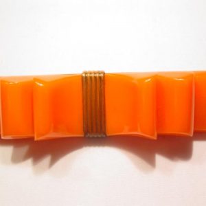 Bright Orange Bakelite Ribbon Pin