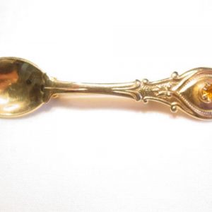 Goldtone Spoon and Imitation Topaz Pin
