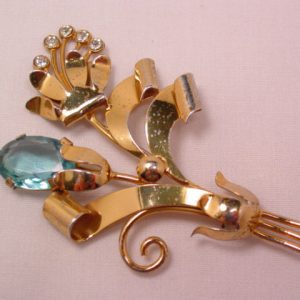 Beautiful Gold-Finished Sterling Flower Pin with Aqua Rhinestone