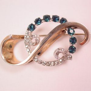 Sterling and Montana Blue and Clear Rhinestone Wreath Around an “S” Pin